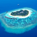 Now, with over 100 to choose from, Rupert Parker picks his best four resorts in the Maldives . Kandolhu from air