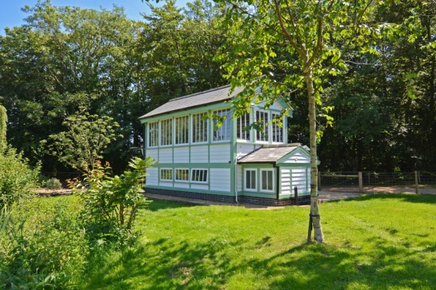 The Signal Box. Ever wondered what life would be like hidden away in a romantic and luxurious railway signal box in deepest North Norfolk? James Ruddy reveals all. Signal Box in sunny times