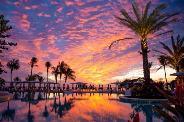 Andy Mossack stays at the Kimpton Seafire Resort and Spa on Grand Cayman Oasis Pool Sunset