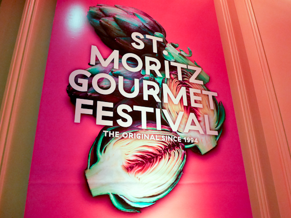 Rupert Parker joins in the St. Moritz Gourmet festival for a feast of fine dining in this famous Swiss resort. St Moritz Gourmet Festival Sign