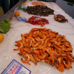 Eating out on the Algarve Seafood galore at Faro market. e1596445476195