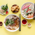 Delicious Pho, Spitalfields London 10 Pho with a side of prawns and spring rolls credit Delicious Pho e1645588400477