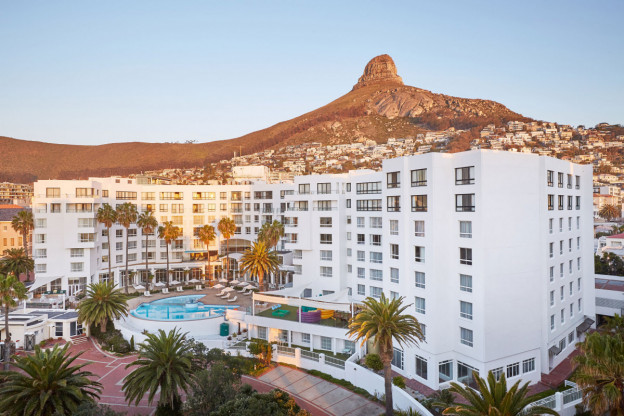 The President Hotel's historic position along South Africa’s Atlantic Seaboard delivers affordable comfort The President Dusk e1644421131981